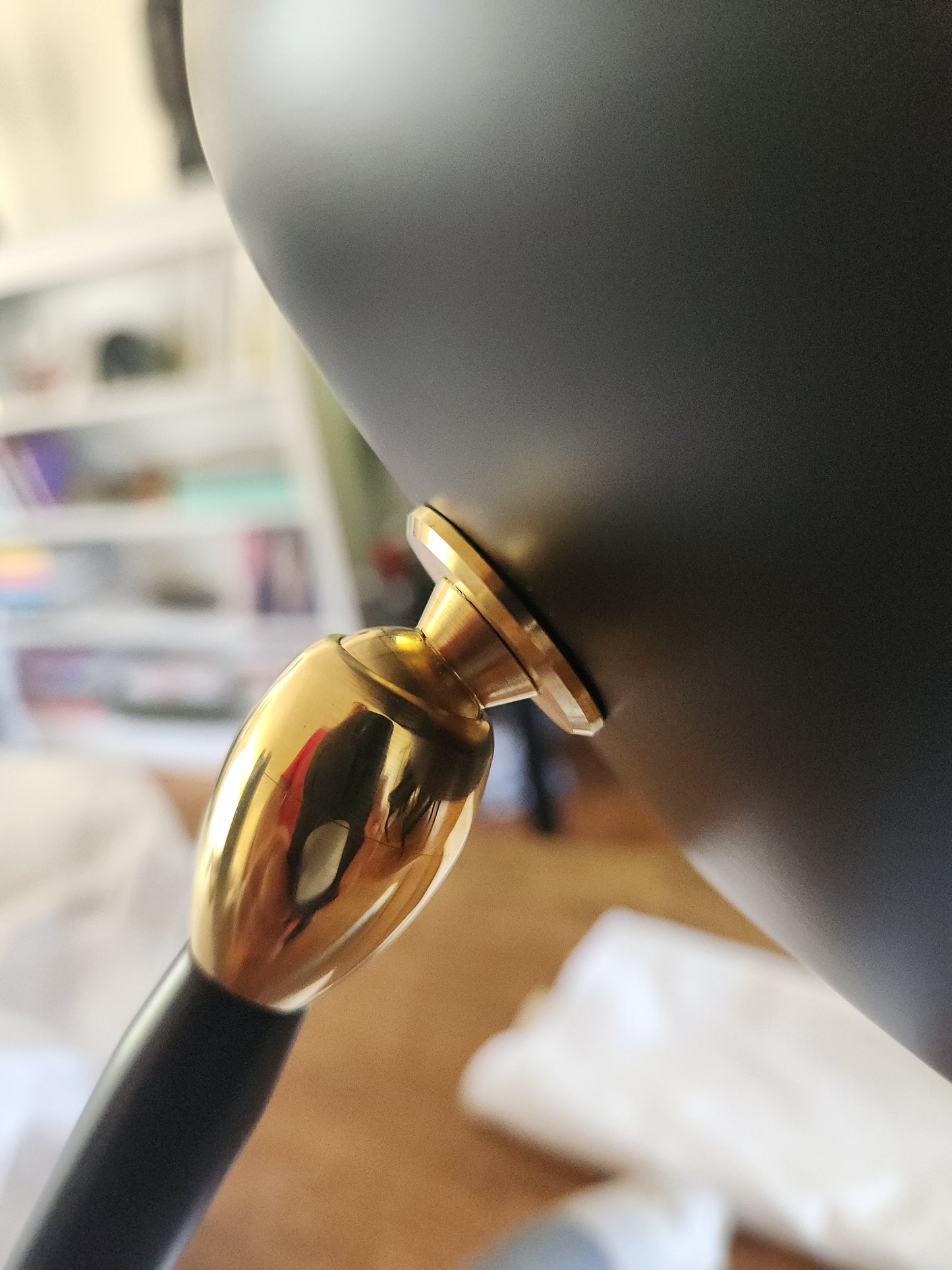 Black Serge Mouille Tripod Desk Lamp - Closeup View of brass connector