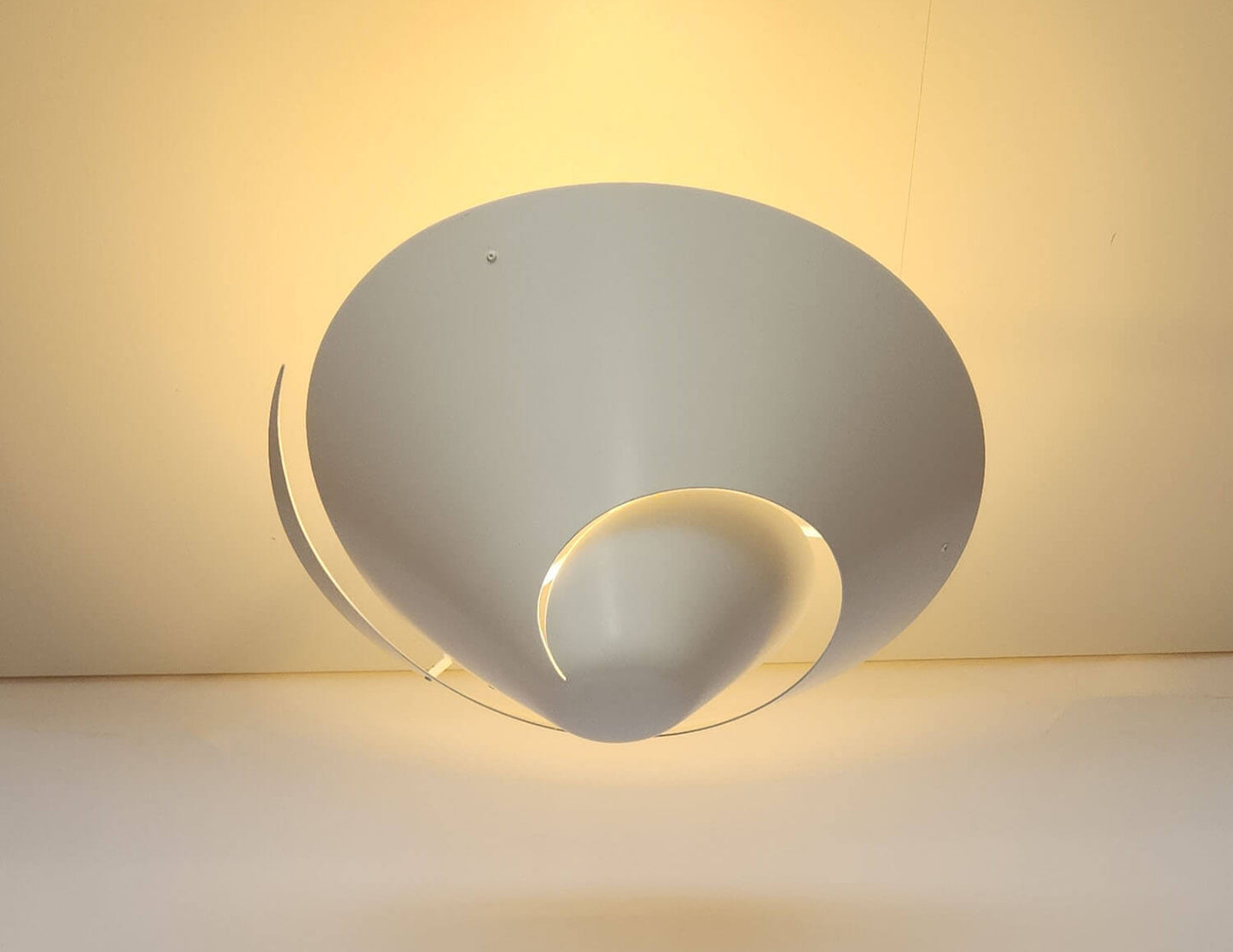 White Serge Mouille Medium Snail Ceiling Lamp Illuminating the Ceiling