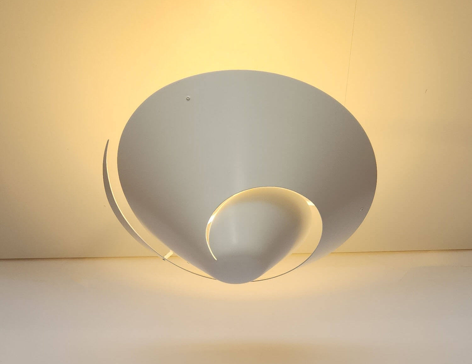 White Serge Mouille Medium Snail Ceiling Lamp Illuminating the Ceiling