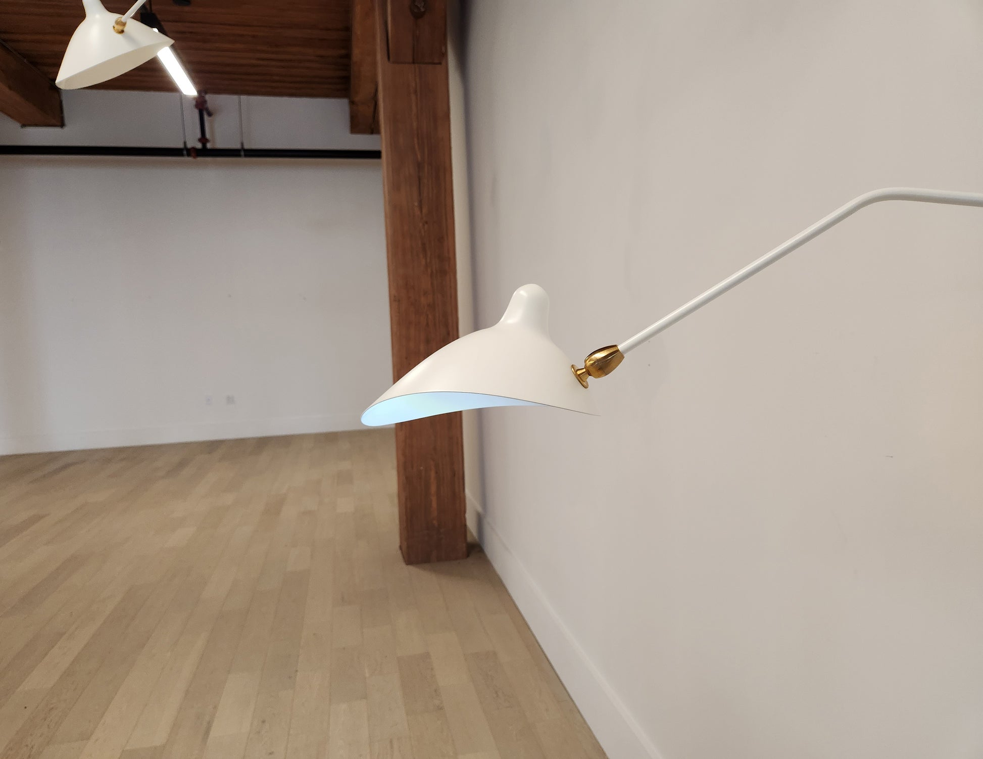 White Serge Mouille Rotating Sconce with 4 Arms - closeup of shade