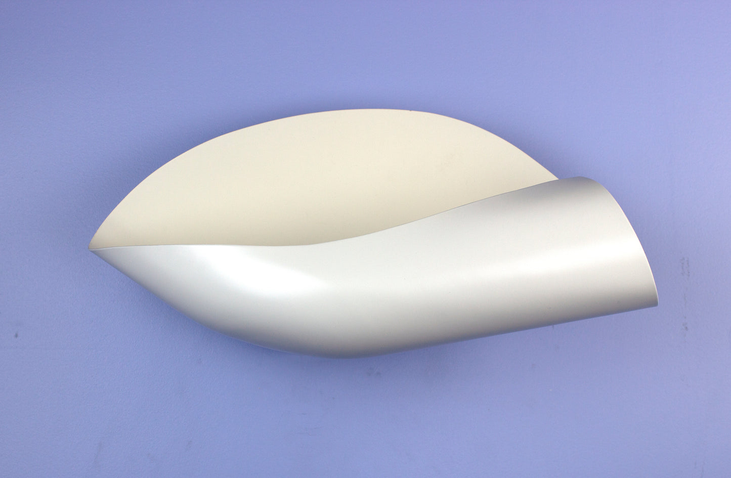 White Serge Mouille Conche (Shell) Sconce on a blue wall