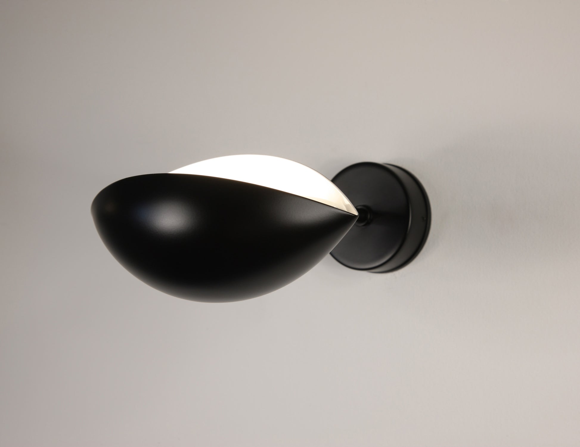 Black Serge Mouille Eye Sconce with upward illumination - SergeMouilleUSA